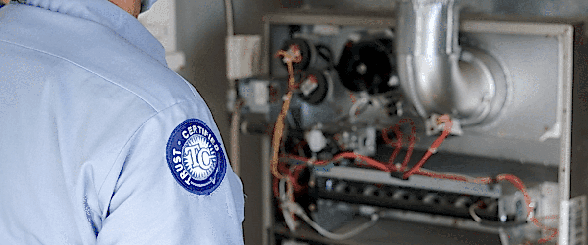 Brody Pennell technician identifying maintenance needed for furnace